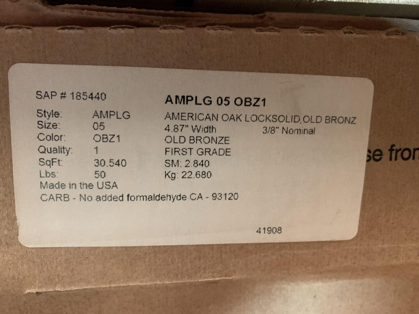 A box of an old bronze lamp with the label for amplo 9 5 obzi.